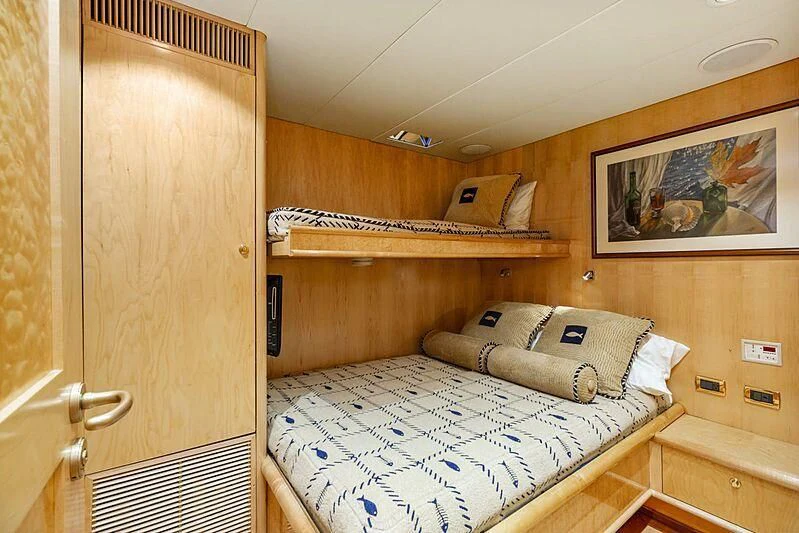 a bedroom with bunk beds aboard HOLIDAY Yacht for Sale