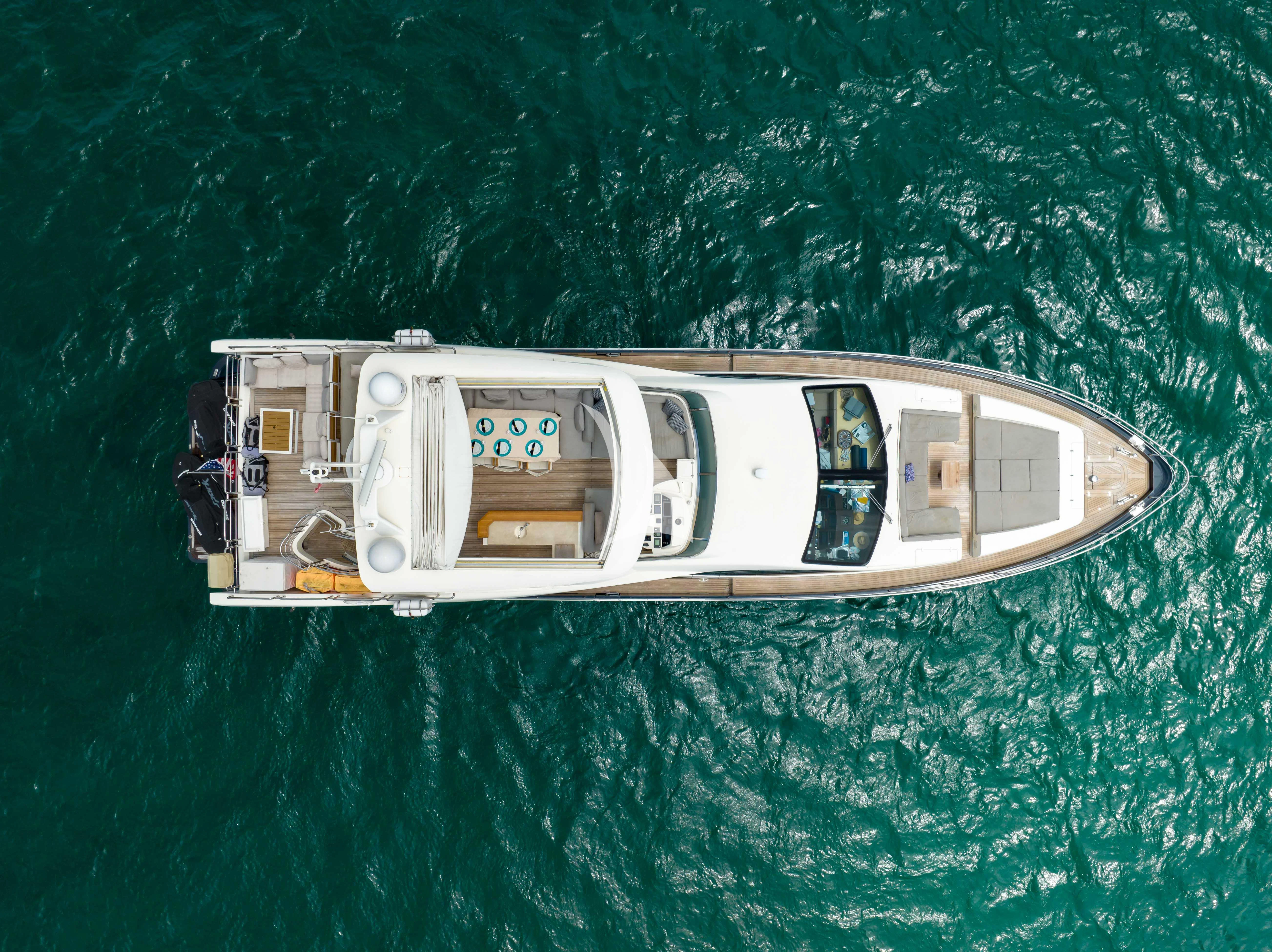a small boat on a body of water aboard SKY Yacht for Sale