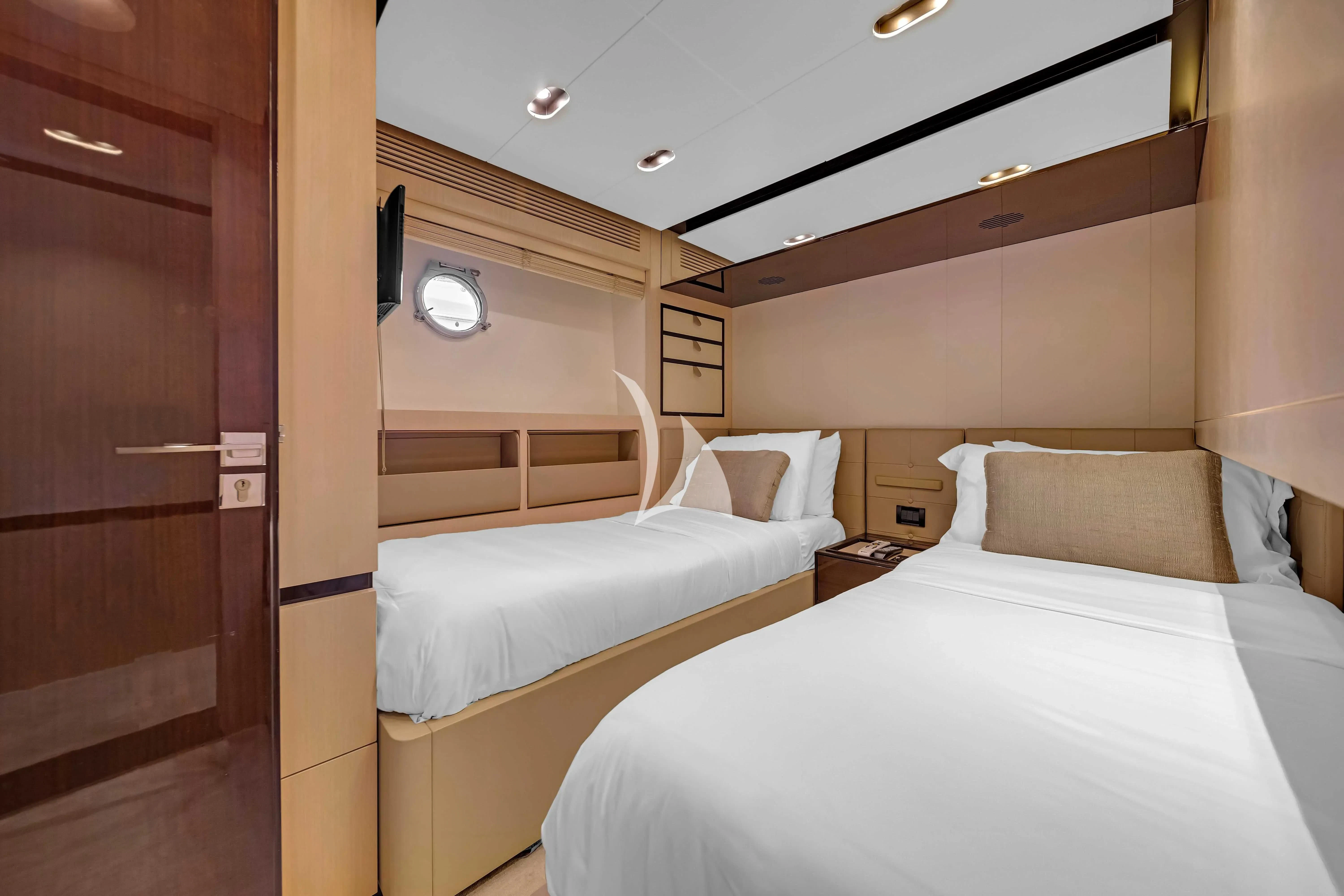 a room with two beds aboard SKY Yacht for Sale