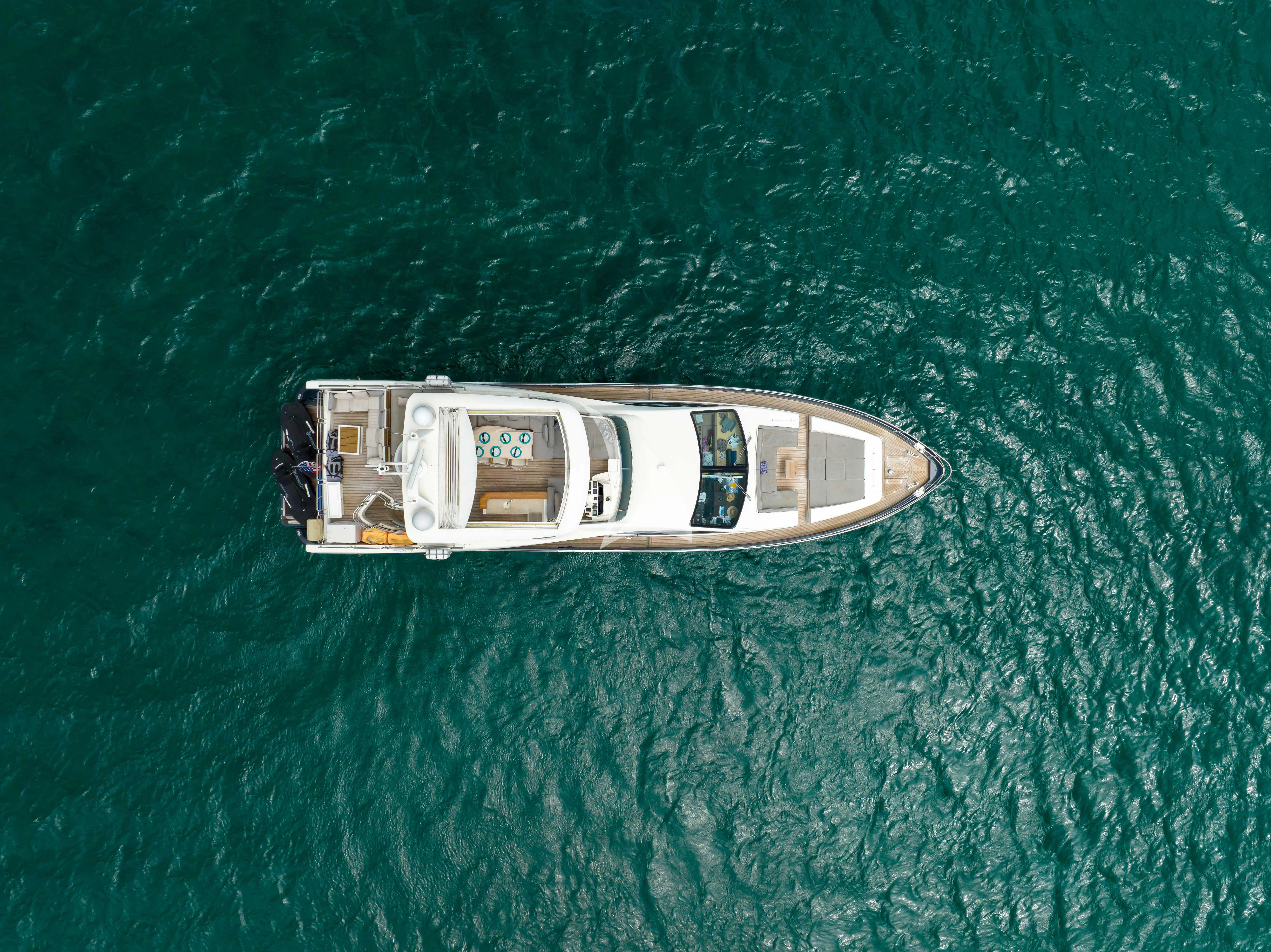 a metal object on a green surface aboard SKY Yacht for Sale