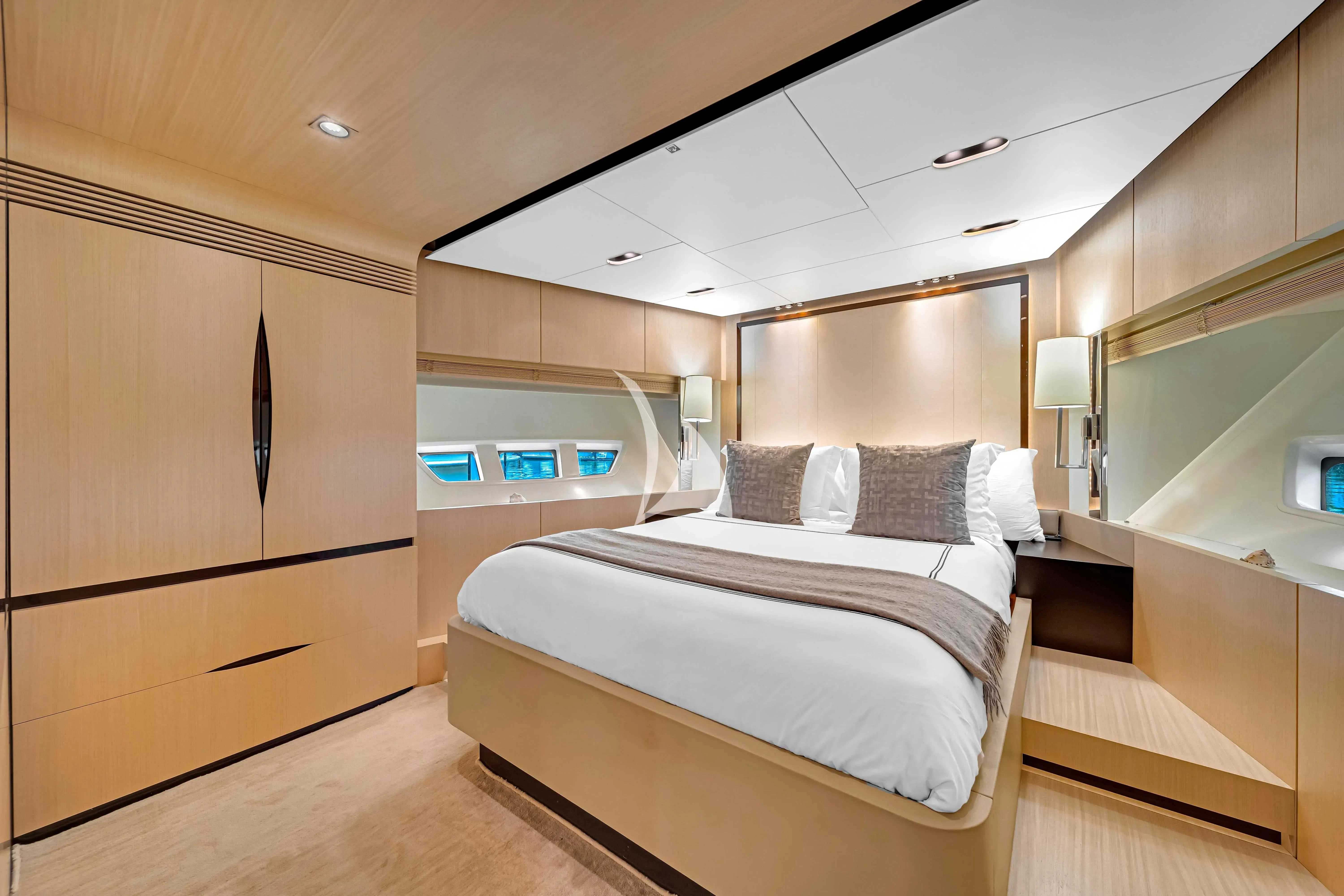 a room with two beds aboard SKY Yacht for Sale