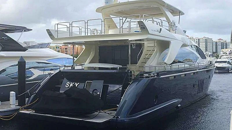 a boat docked at a pier aboard SKY Yacht for Sale