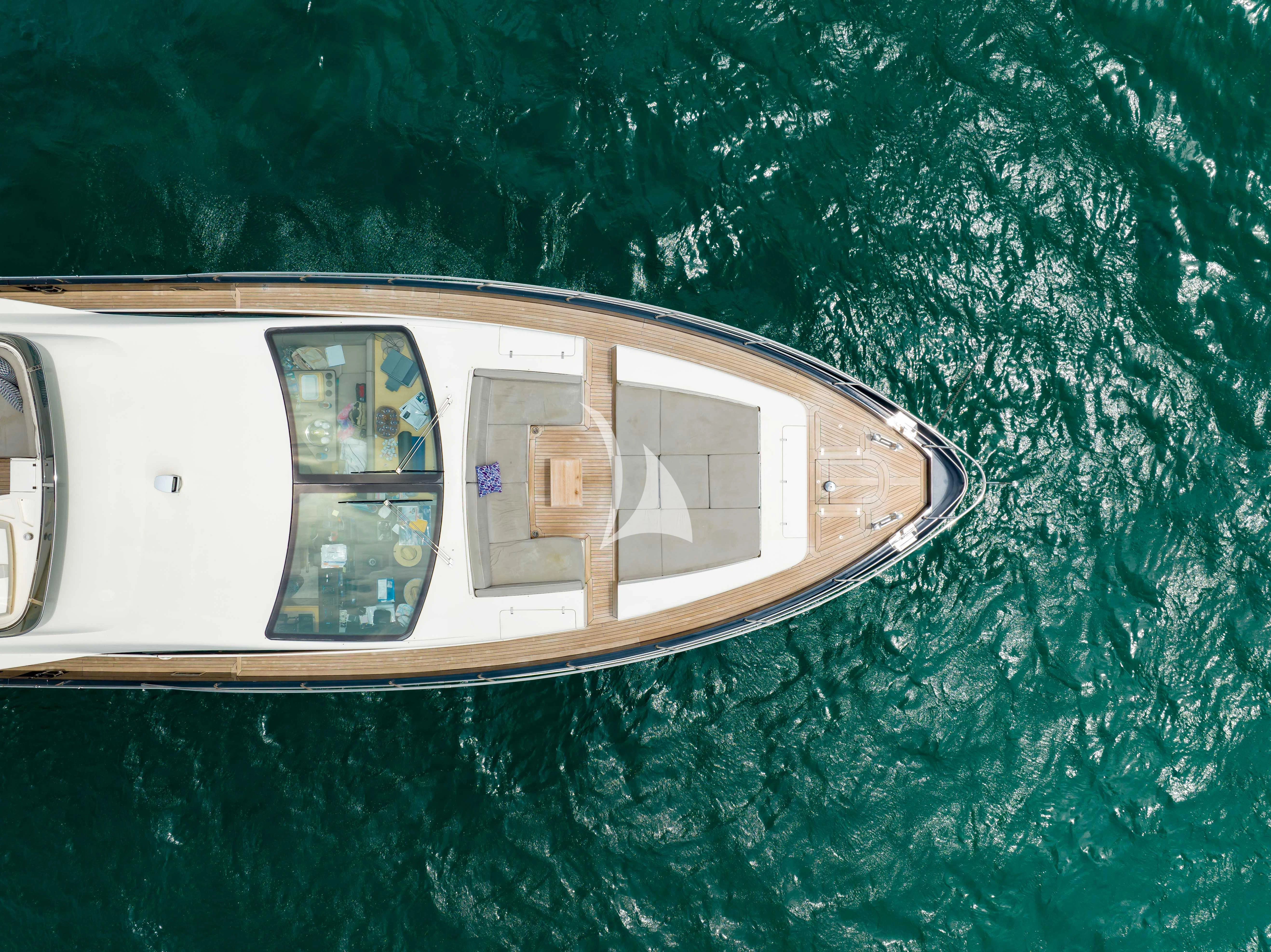 a car with a screen on the window aboard SKY Yacht for Sale