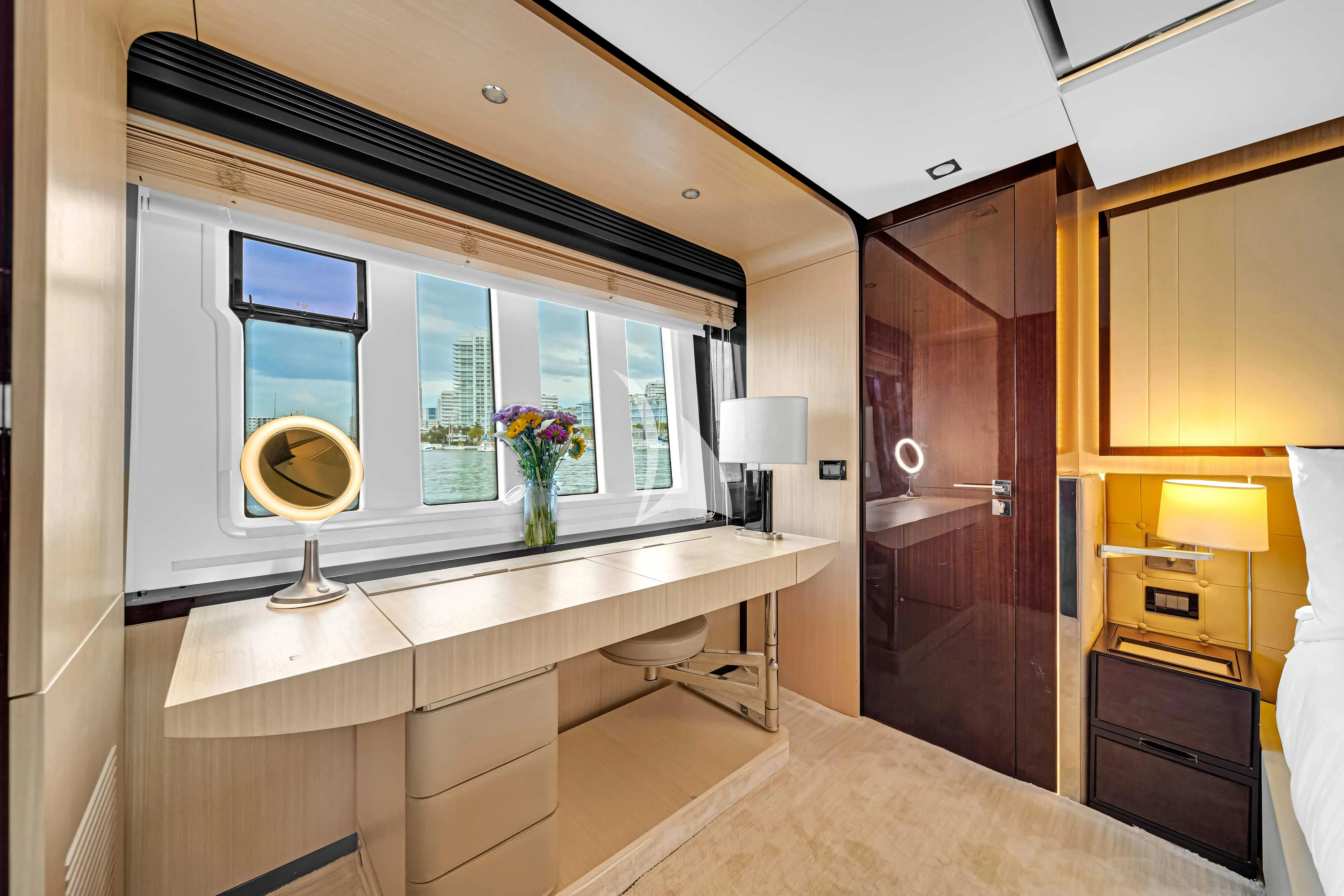 a bathroom with a large mirror aboard SKY Yacht for Sale