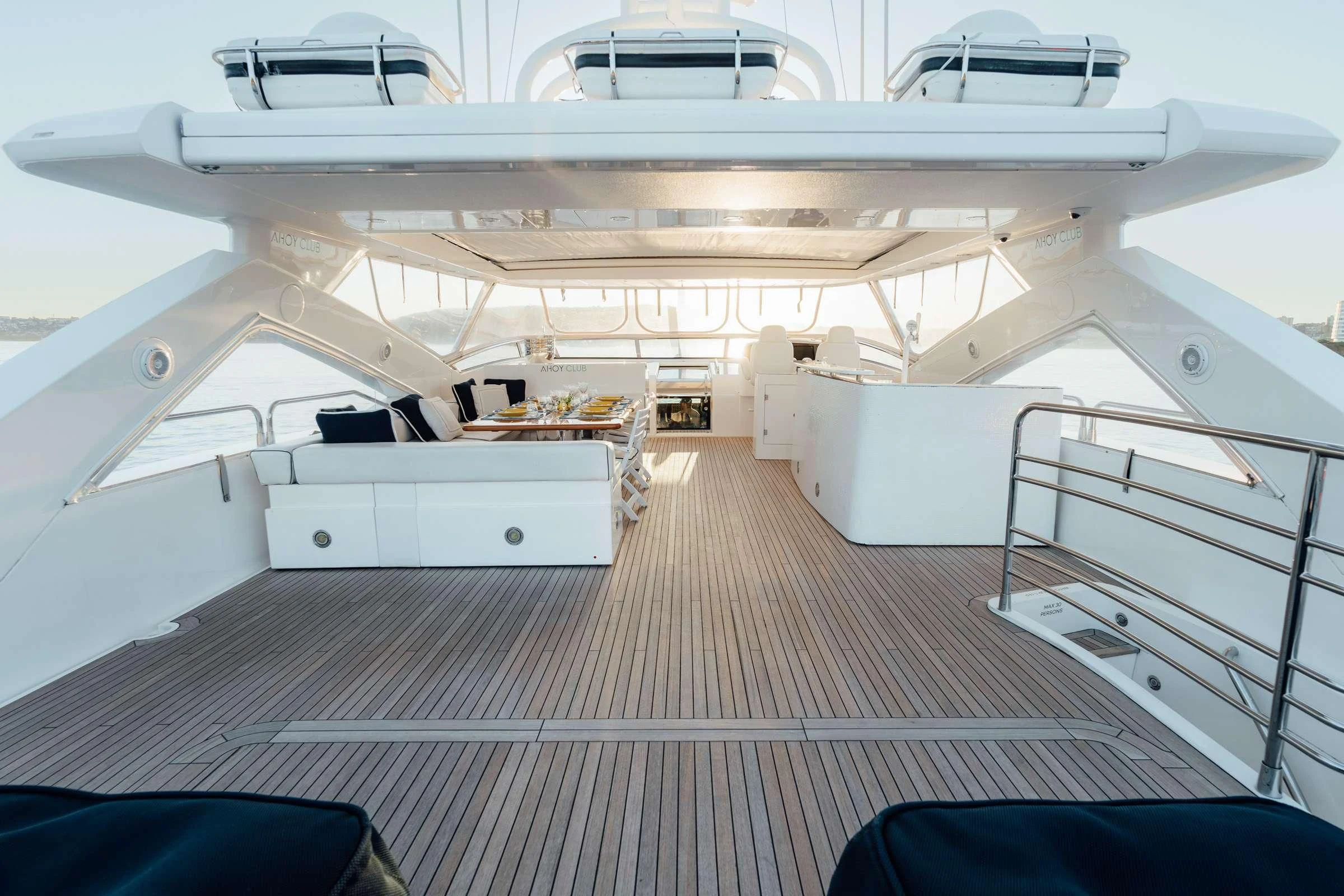 a large white boat aboard CHAOS Yacht for Sale