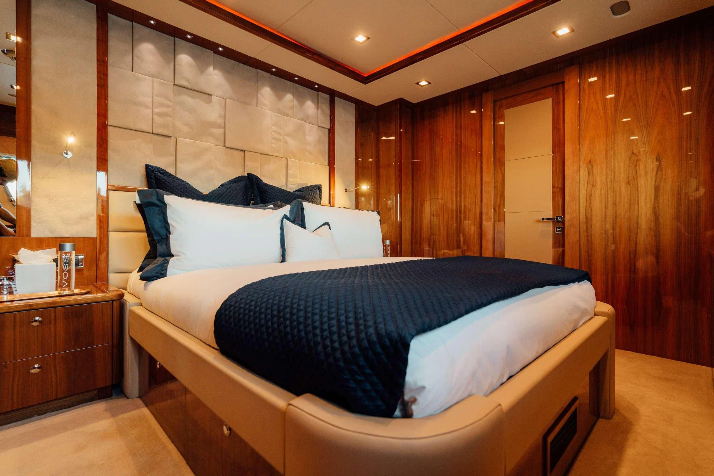 a bed in a room aboard CHAOS Yacht for Sale