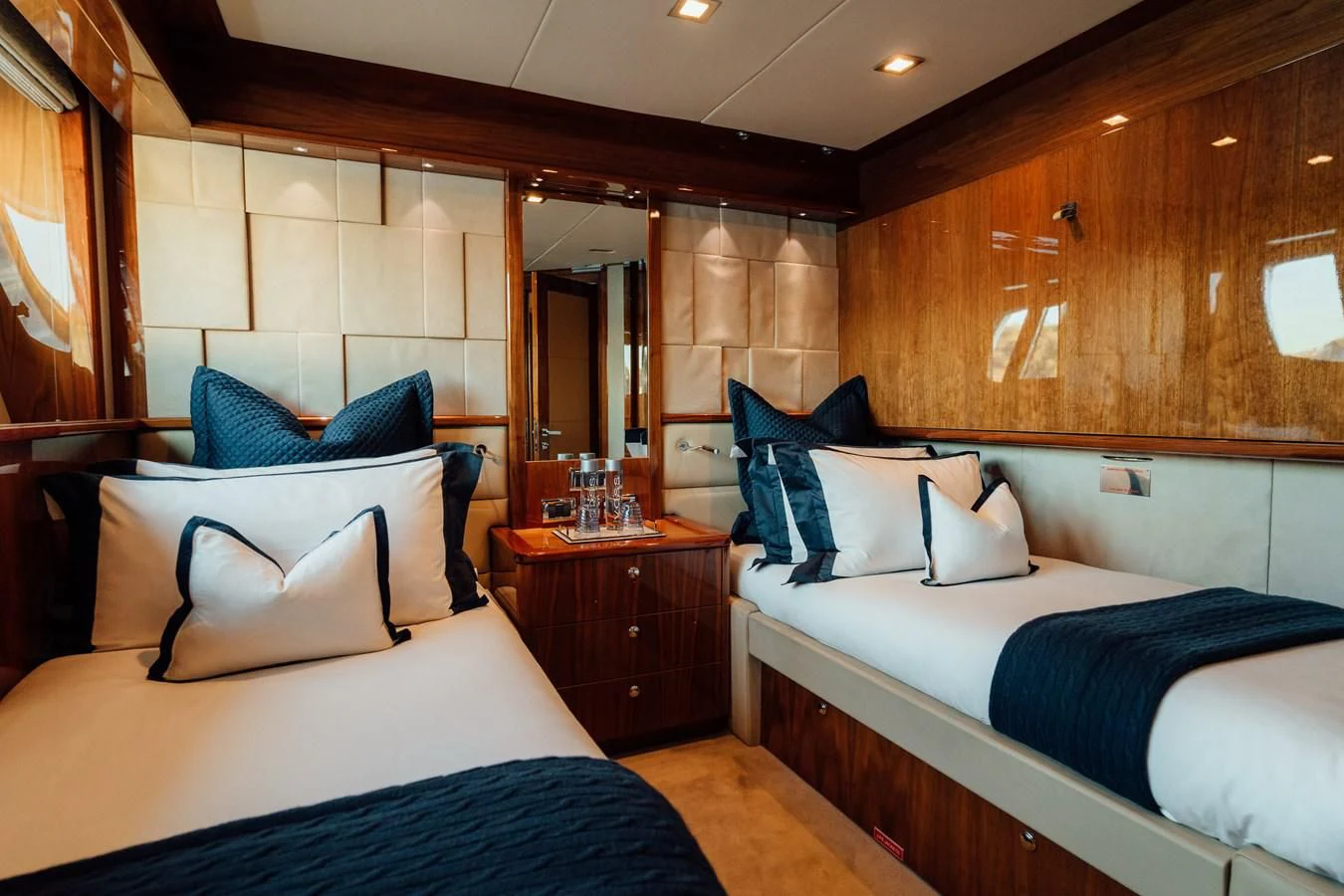 a room with two beds aboard CHAOS Yacht for Sale