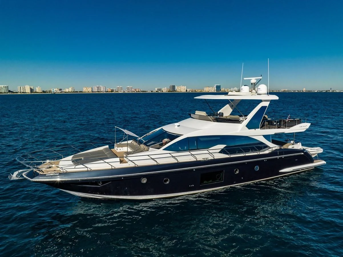 a white yacht in the water aboard KNOT DIVORCE Yacht for Sale