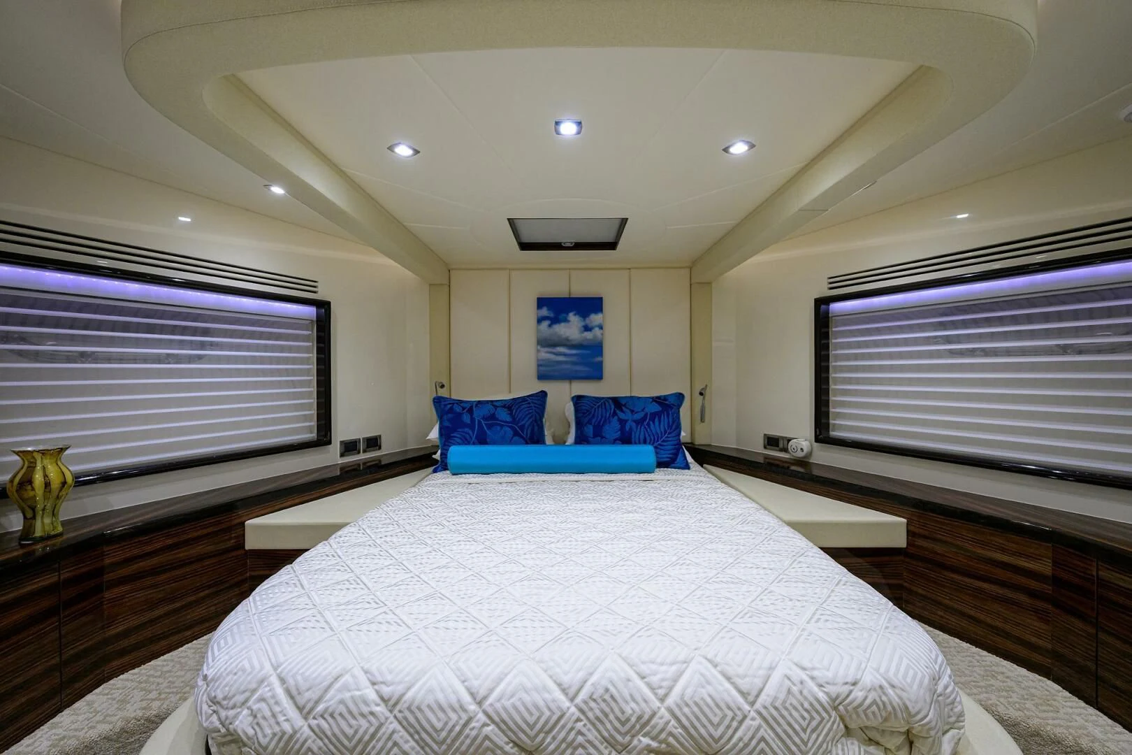 a large white bed in a room aboard FUJIMO Yacht for Sale
