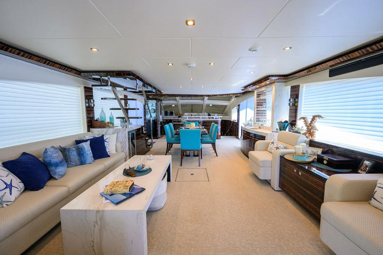 a living room with a large window aboard FUJIMO Yacht for Sale