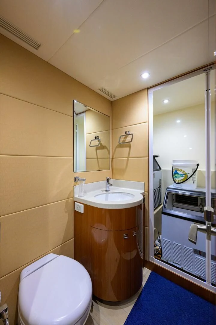 a bathroom with a sink and a toilet aboard FUJIMO Yacht for Sale