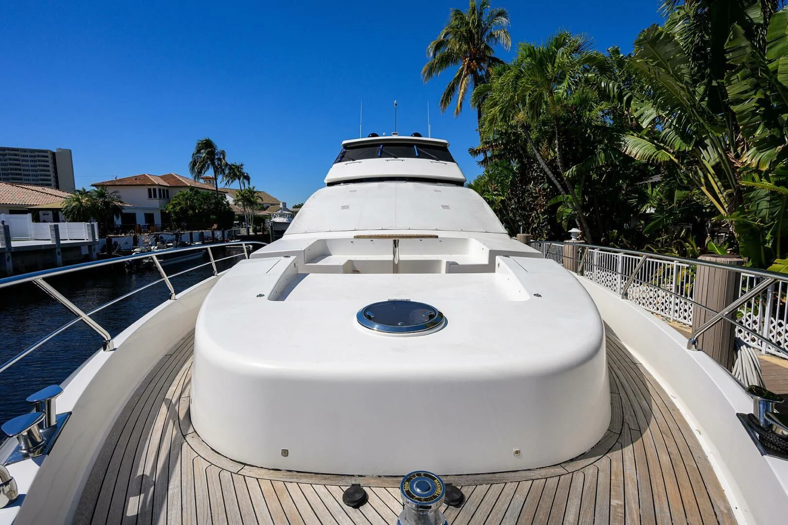 a white boat on a deck aboard FUJIMO Yacht for Sale