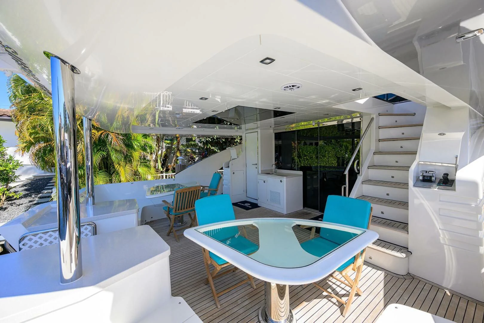 a large white room with a pool table and chairs aboard FUJIMO Yacht for Sale