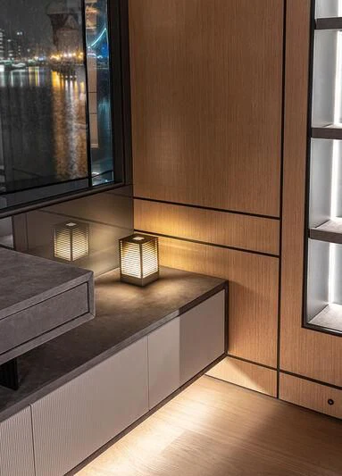 a wooden cabinet with a light inside aboard ACE Yacht for Sale