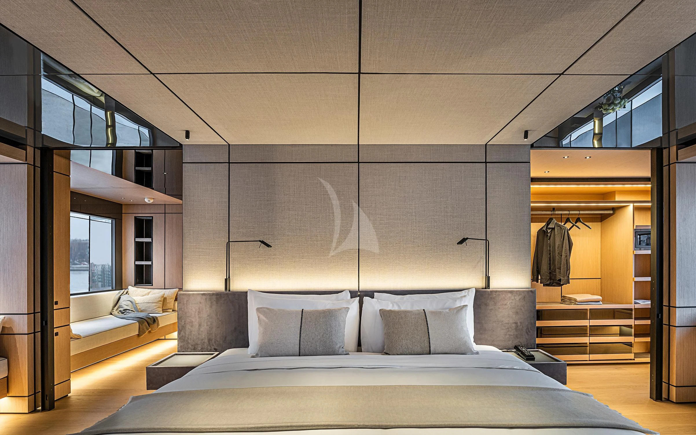 a room with a bed and a couch aboard ACE Yacht for Sale