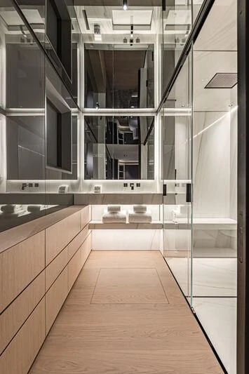 a room with a large glass door aboard ACE Yacht for Sale