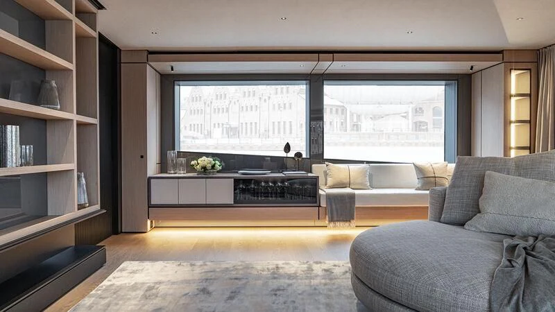 a living room with a large window aboard ACE Yacht for Sale