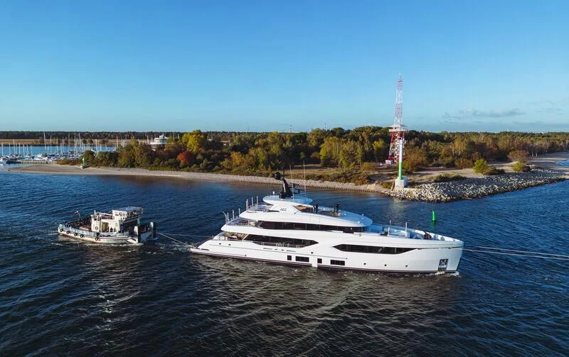 a couple of boats on the water aboard ACE Yacht for Sale