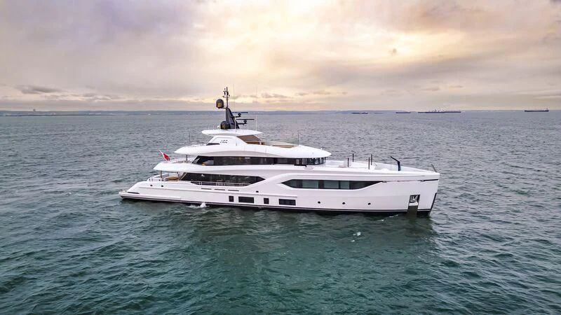 a white boat in the water aboard ACE Yacht for Sale
