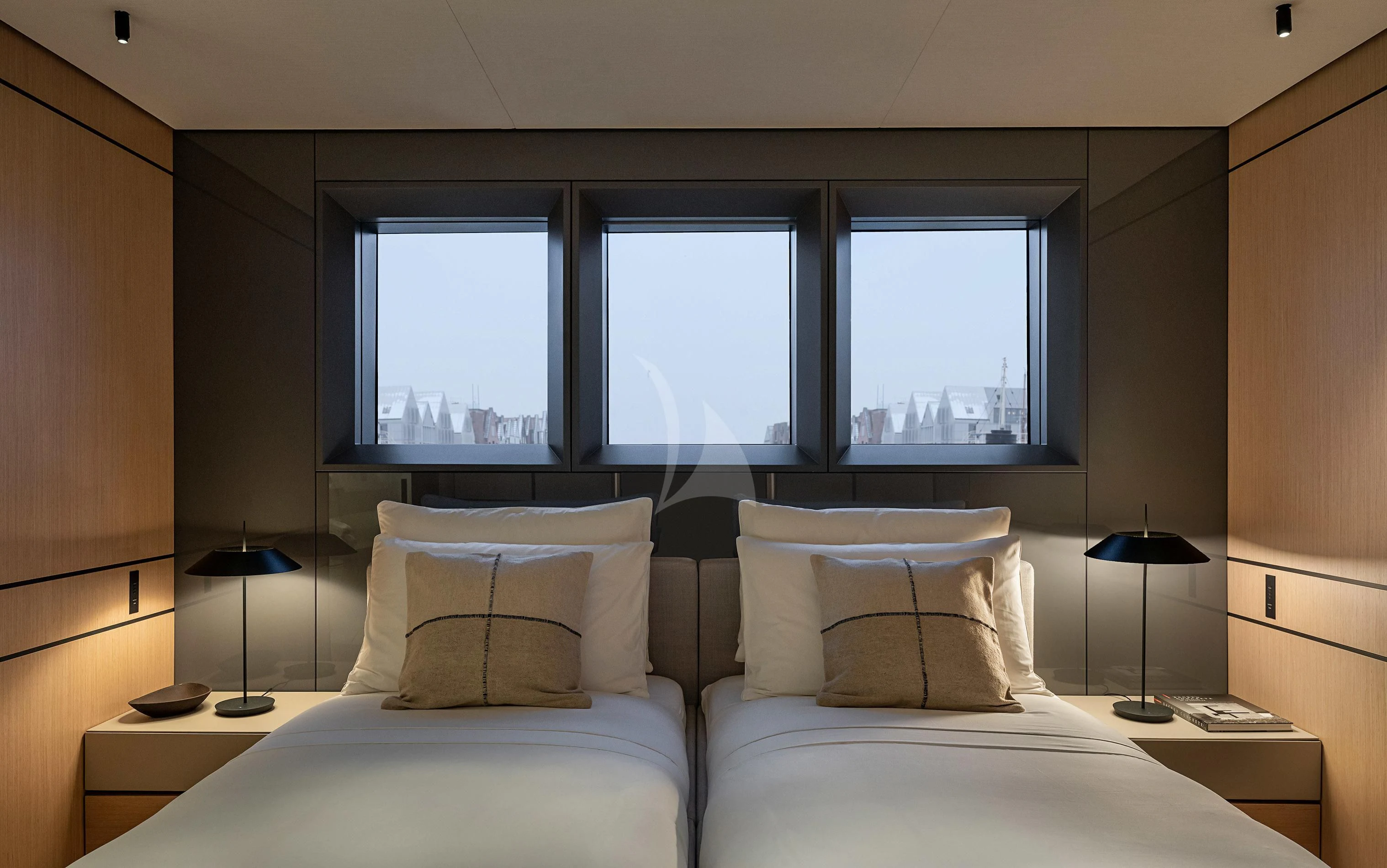 a room with two beds aboard ACE Yacht for Sale