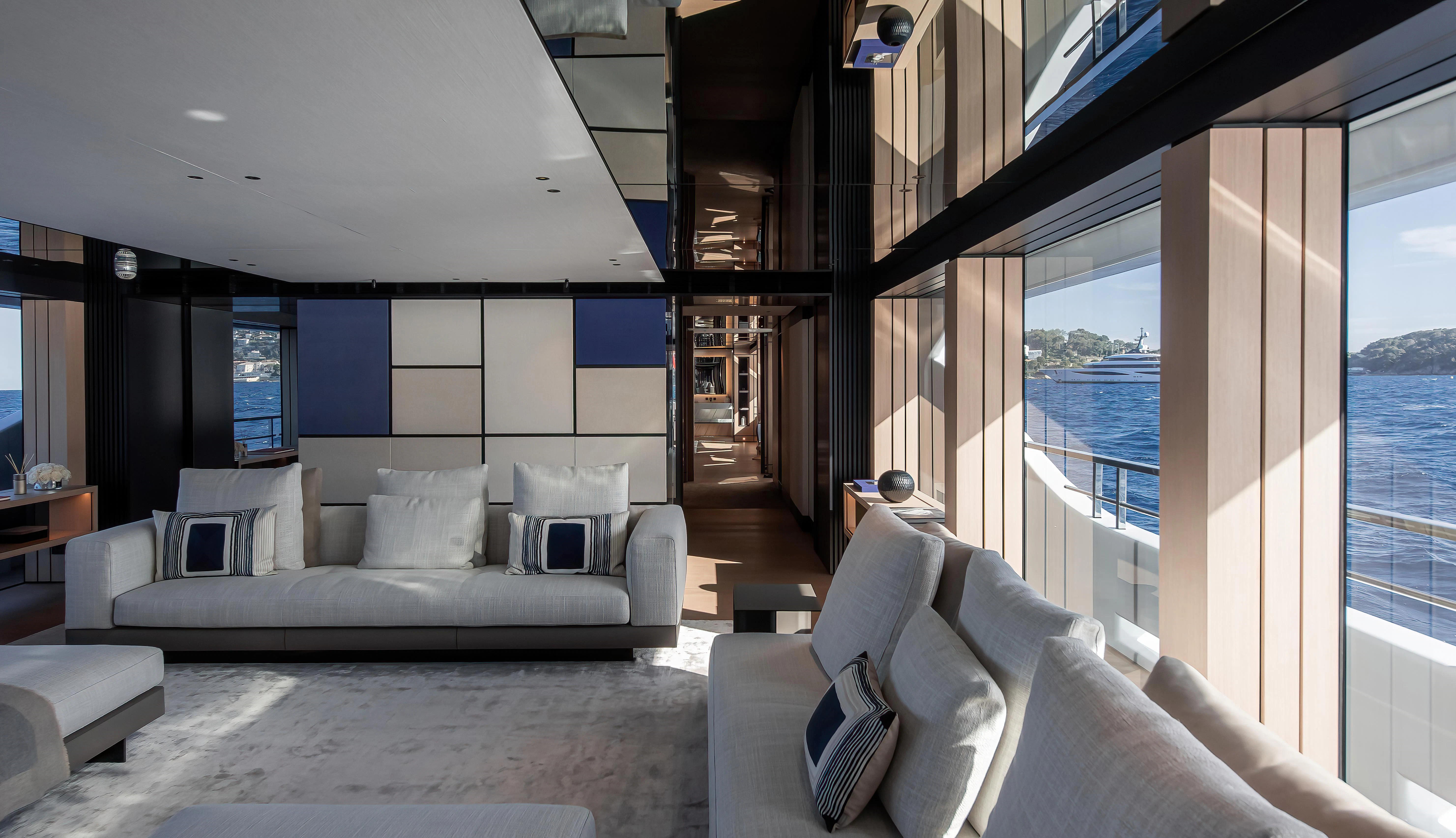 a large living room with a large glass door aboard ACE Yacht for Sale