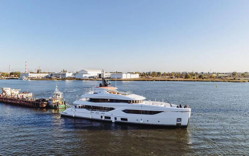 a large white yacht in the water aboard ACE Yacht for Sale