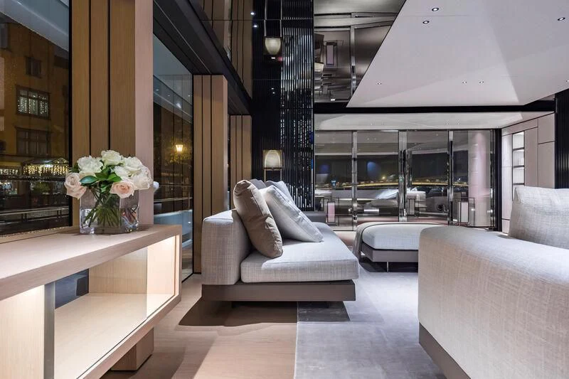 a room with a table and chairs aboard ACE Yacht for Sale