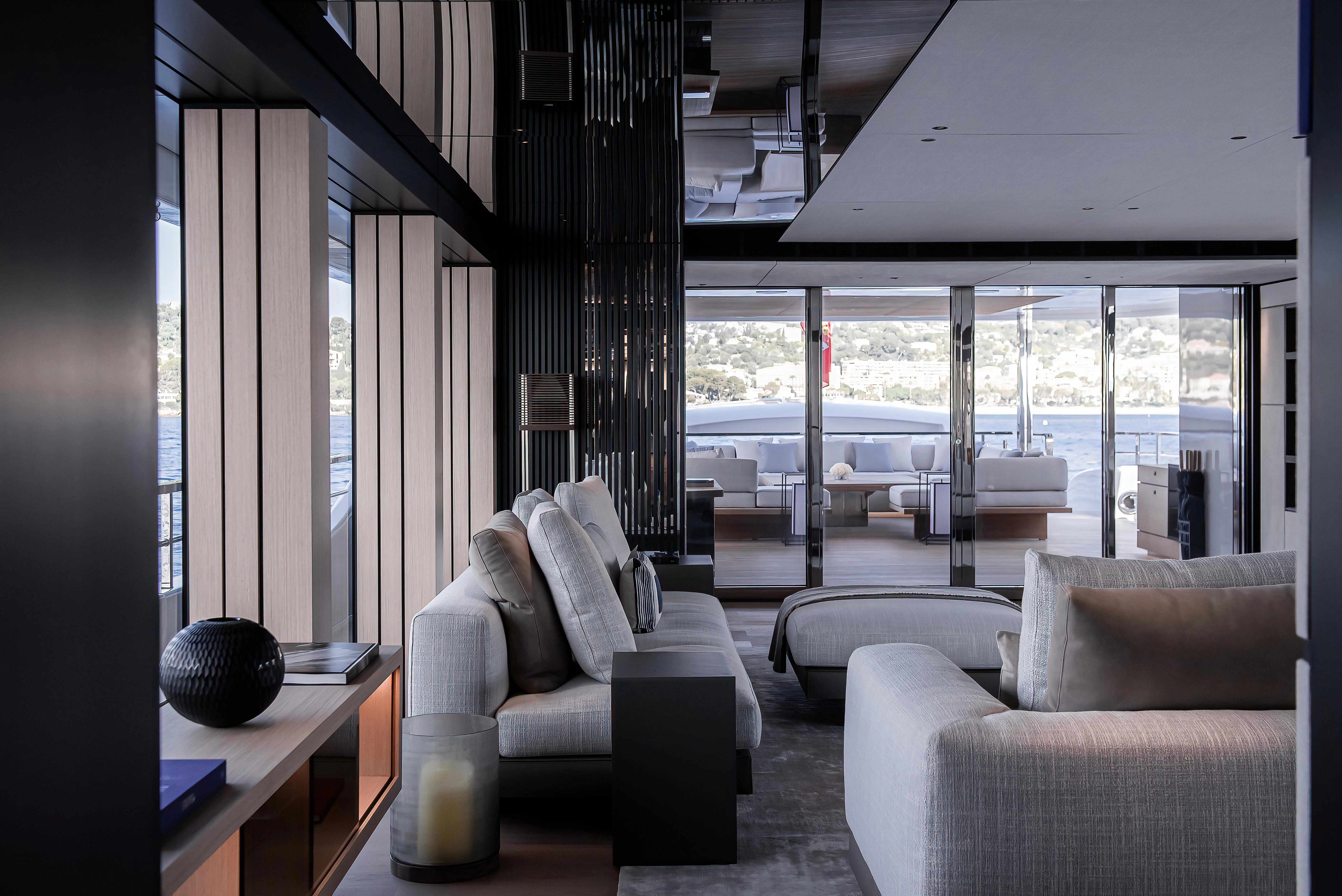 a living room with a large window aboard ACE Yacht for Sale