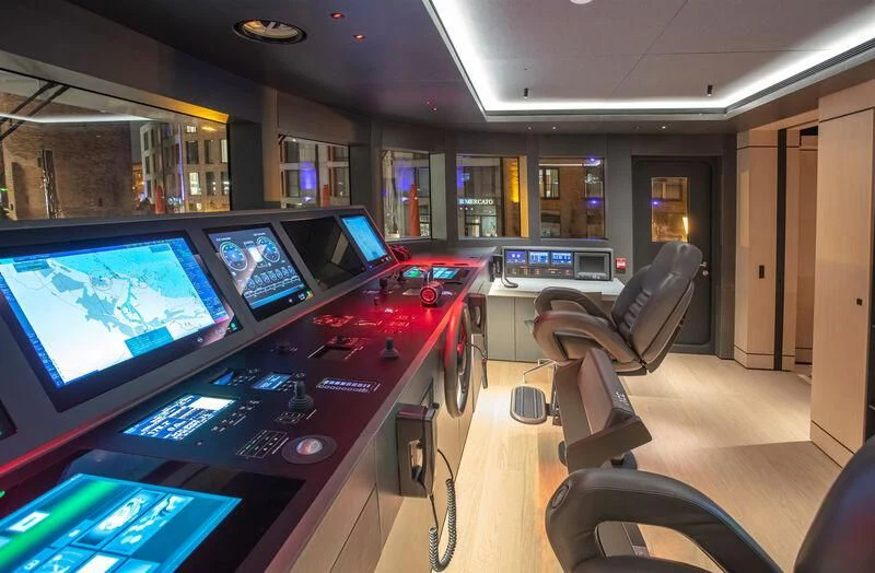 a room with many computers aboard ACE Yacht for Sale
