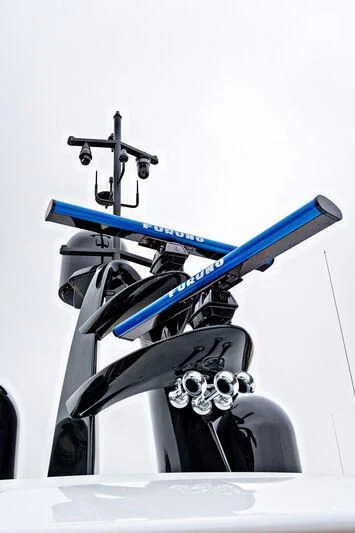 a blue snowboard on a white surface aboard ACE Yacht for Sale