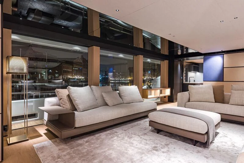 a living room with a large window aboard ACE Yacht for Sale