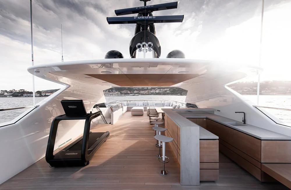 a large white airplane aboard ACE Yacht for Sale