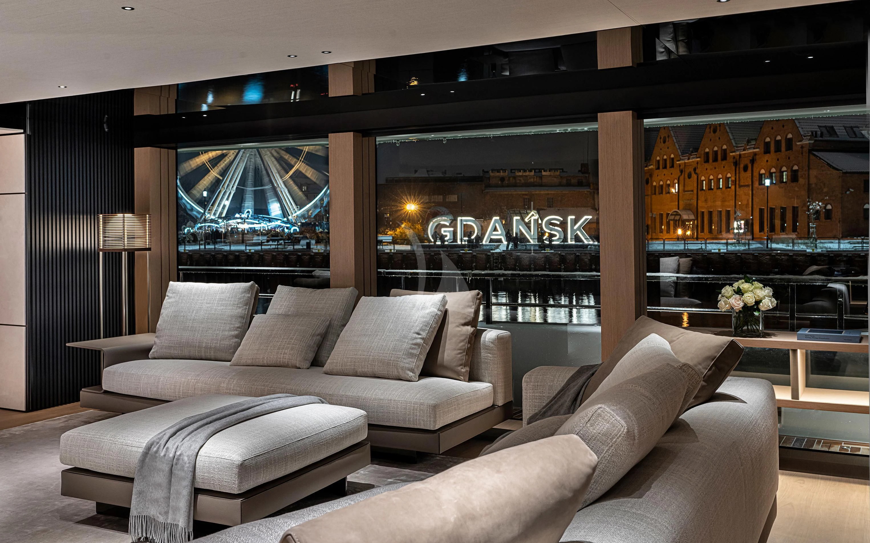 a living room with a large window aboard ACE Yacht for Sale