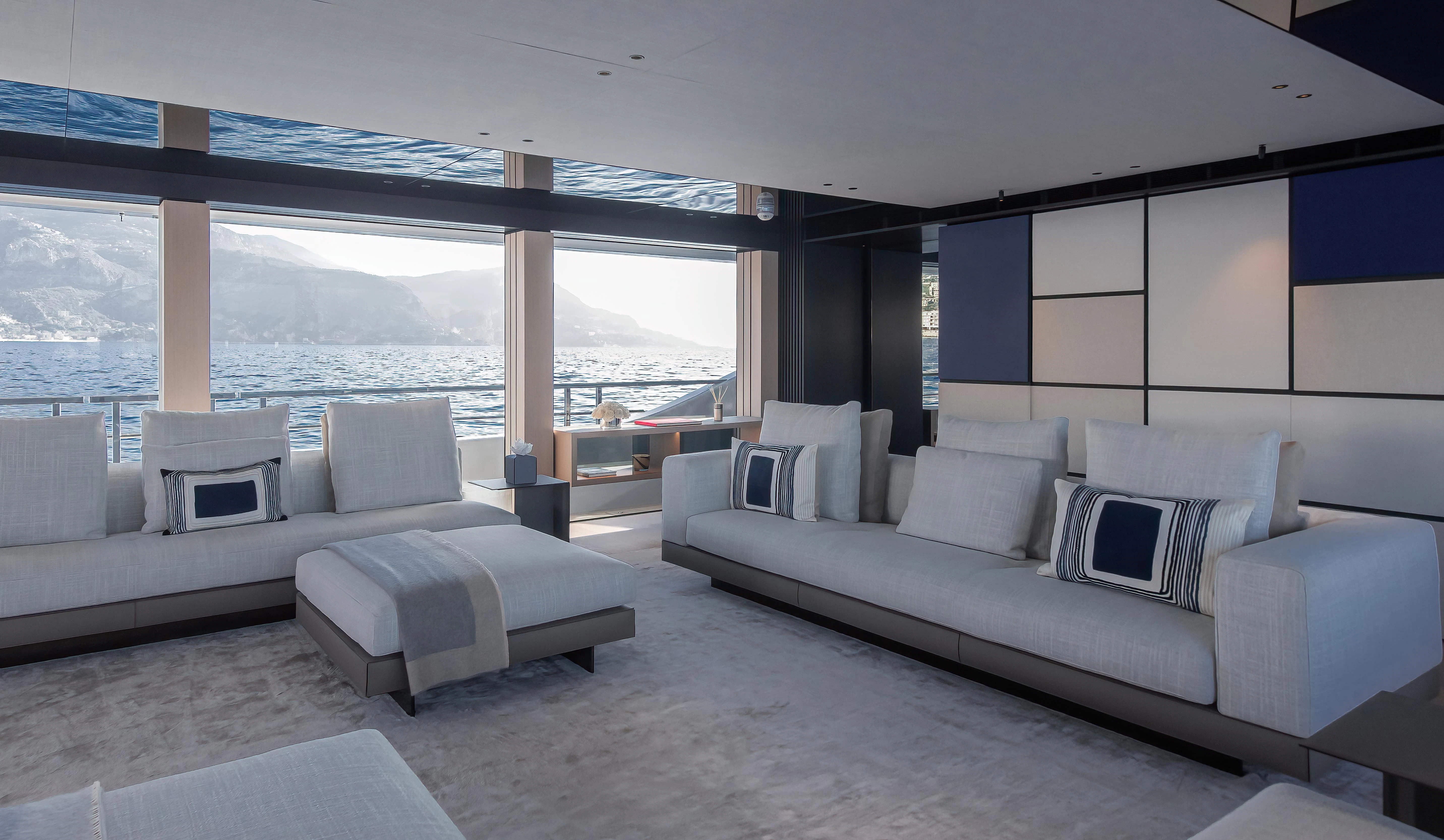 a large living room with a large window aboard ACE Yacht for Sale