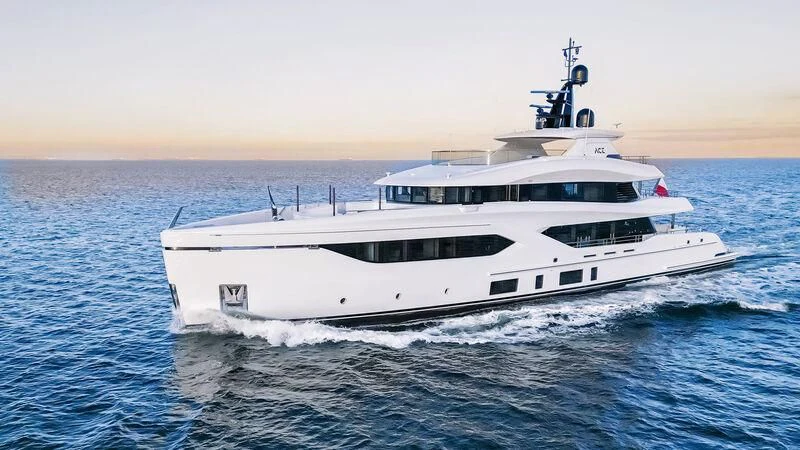 a white boat in the water aboard ACE Yacht for Sale