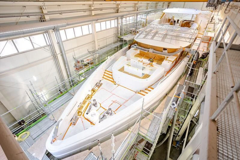 a large building with many floors aboard ACE Yacht for Sale