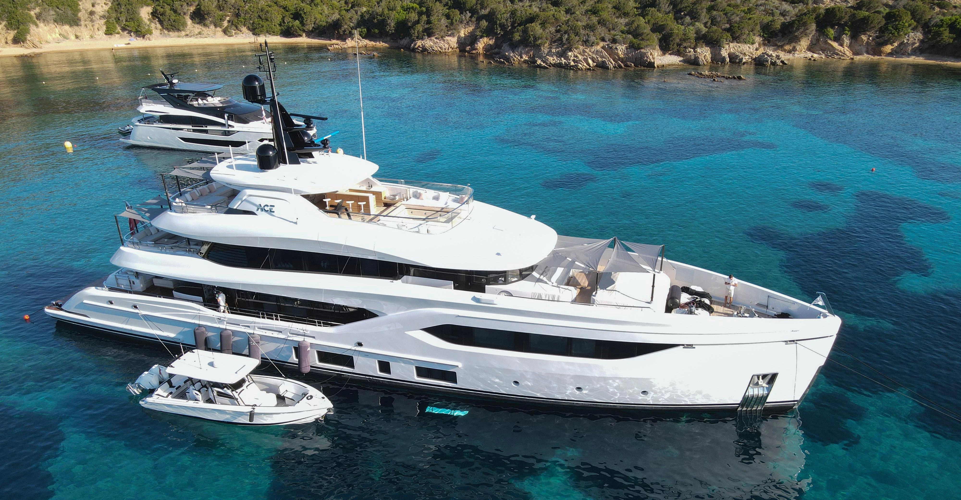 a group of boats in a body of water aboard ACE Yacht for Sale