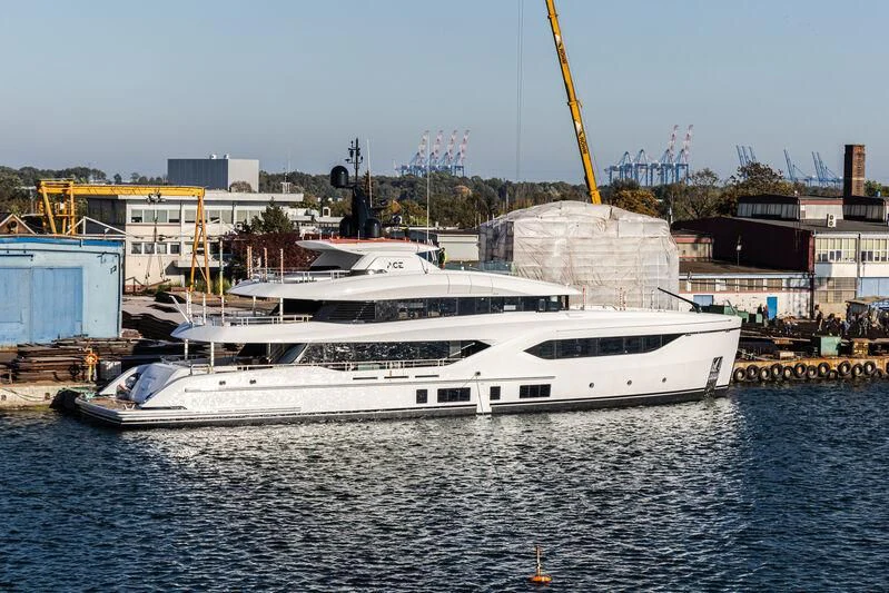 a white boat in the water aboard ACE Yacht for Sale