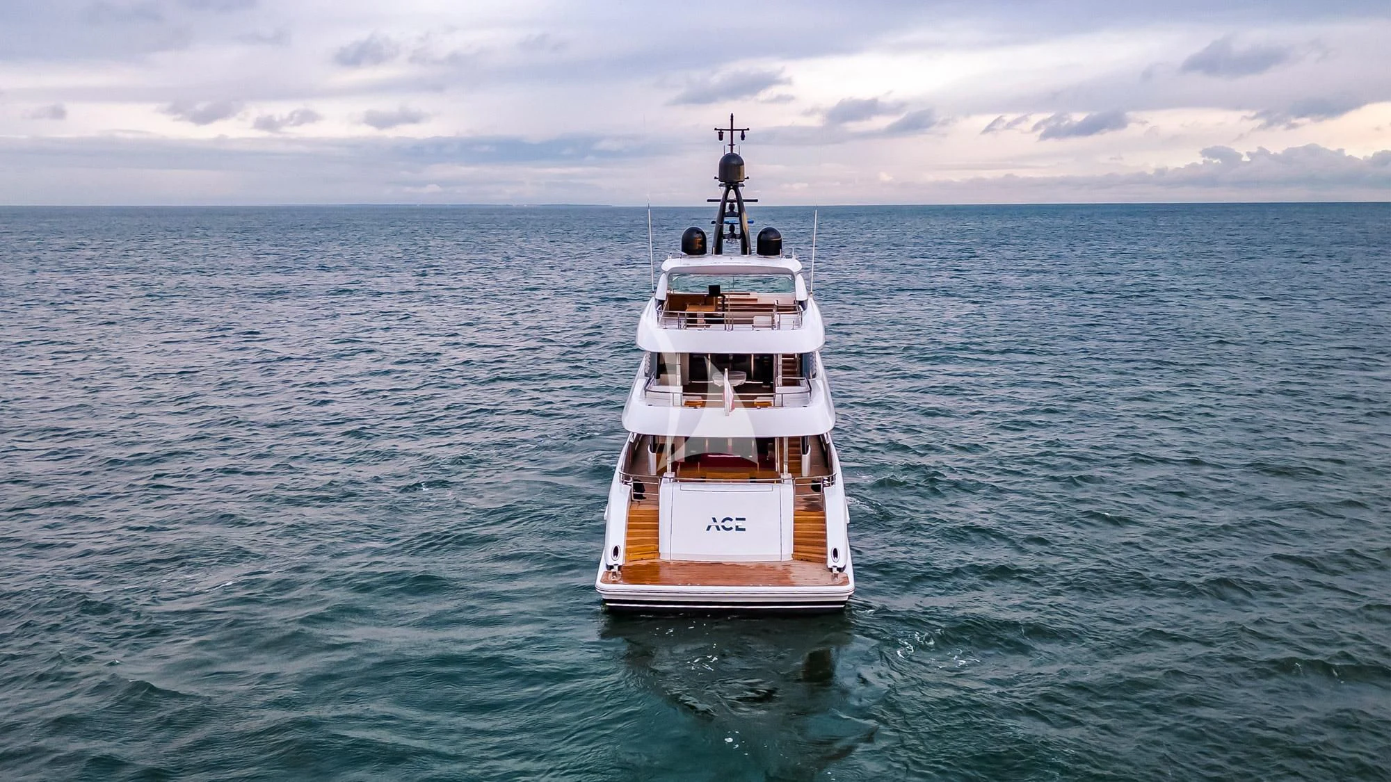 a white and orange boat in the water aboard ACE Yacht for Sale