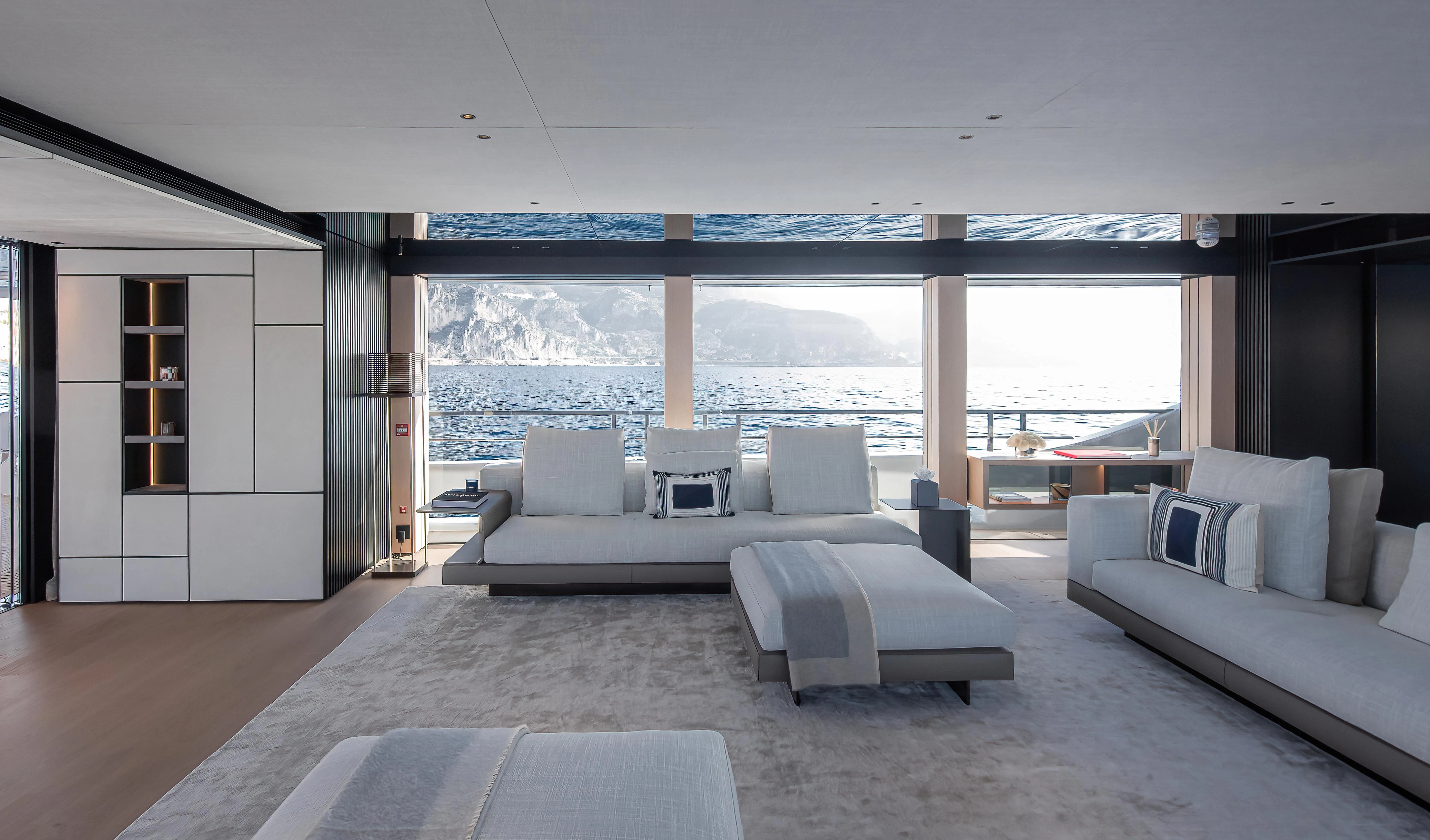 a living room with a large window aboard ACE Yacht for Sale