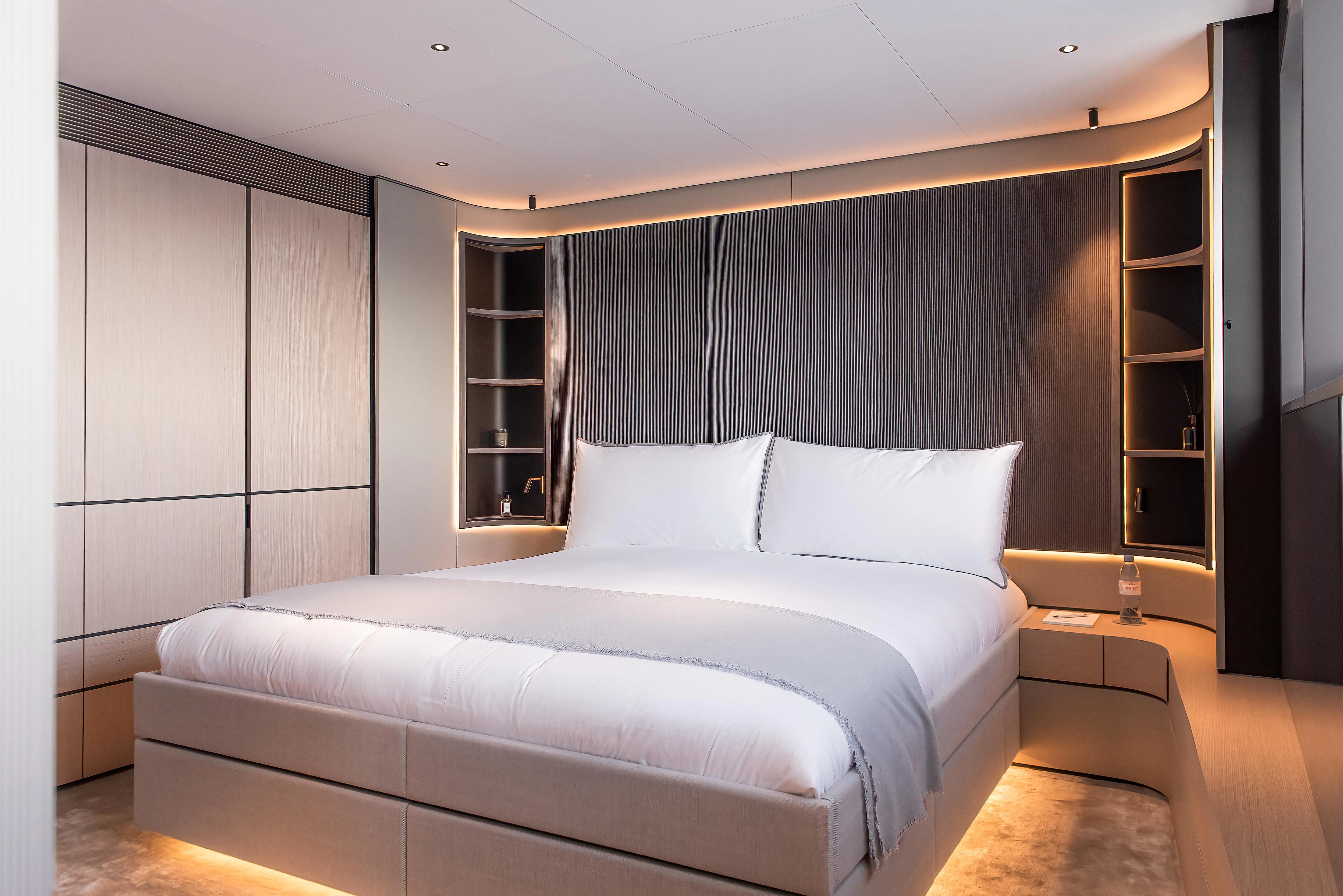 a bed in a room aboard ACE Yacht for Sale