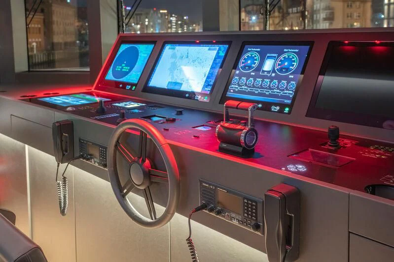 a table with monitors and a camera on it aboard ACE Yacht for Sale