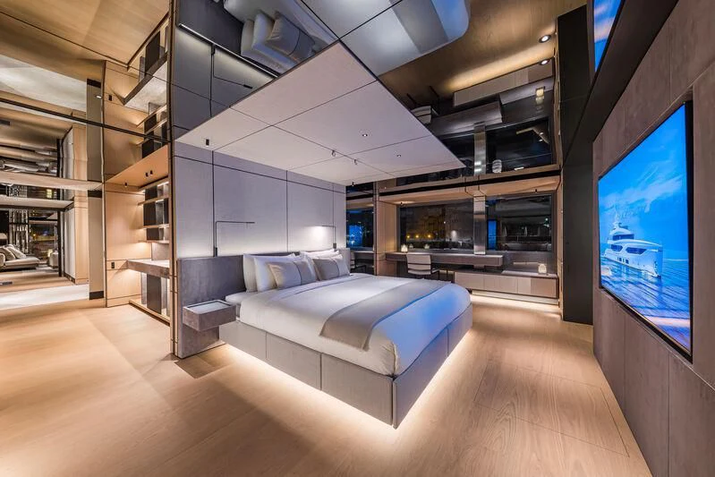 a room with a couch and a tv aboard ACE Yacht for Sale