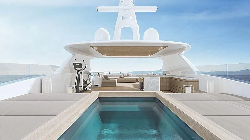 a large white building with a large white tower and a white plane flying over it aboard ACE Yacht for Sale