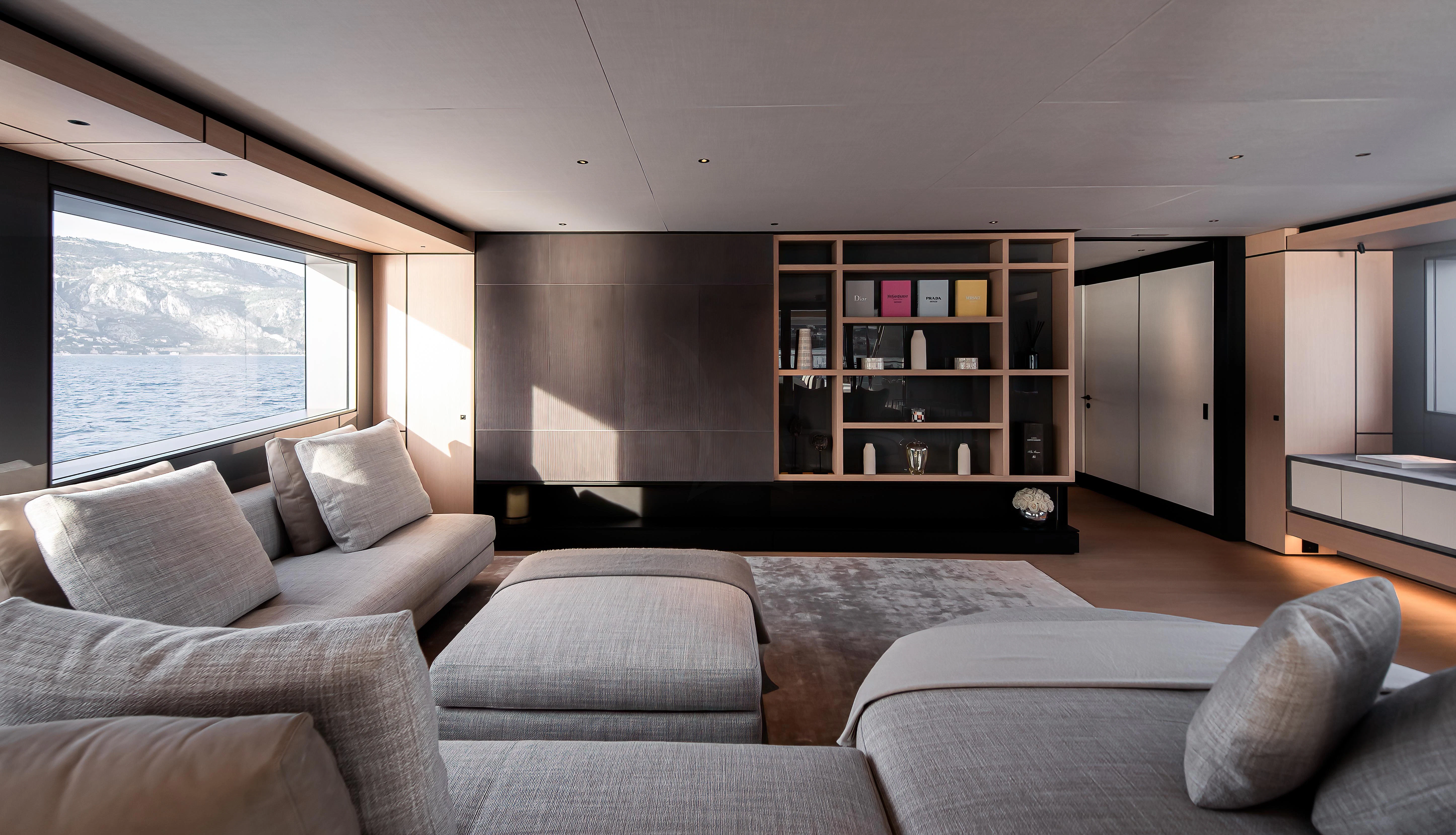 a living room with a large window aboard ACE Yacht for Sale