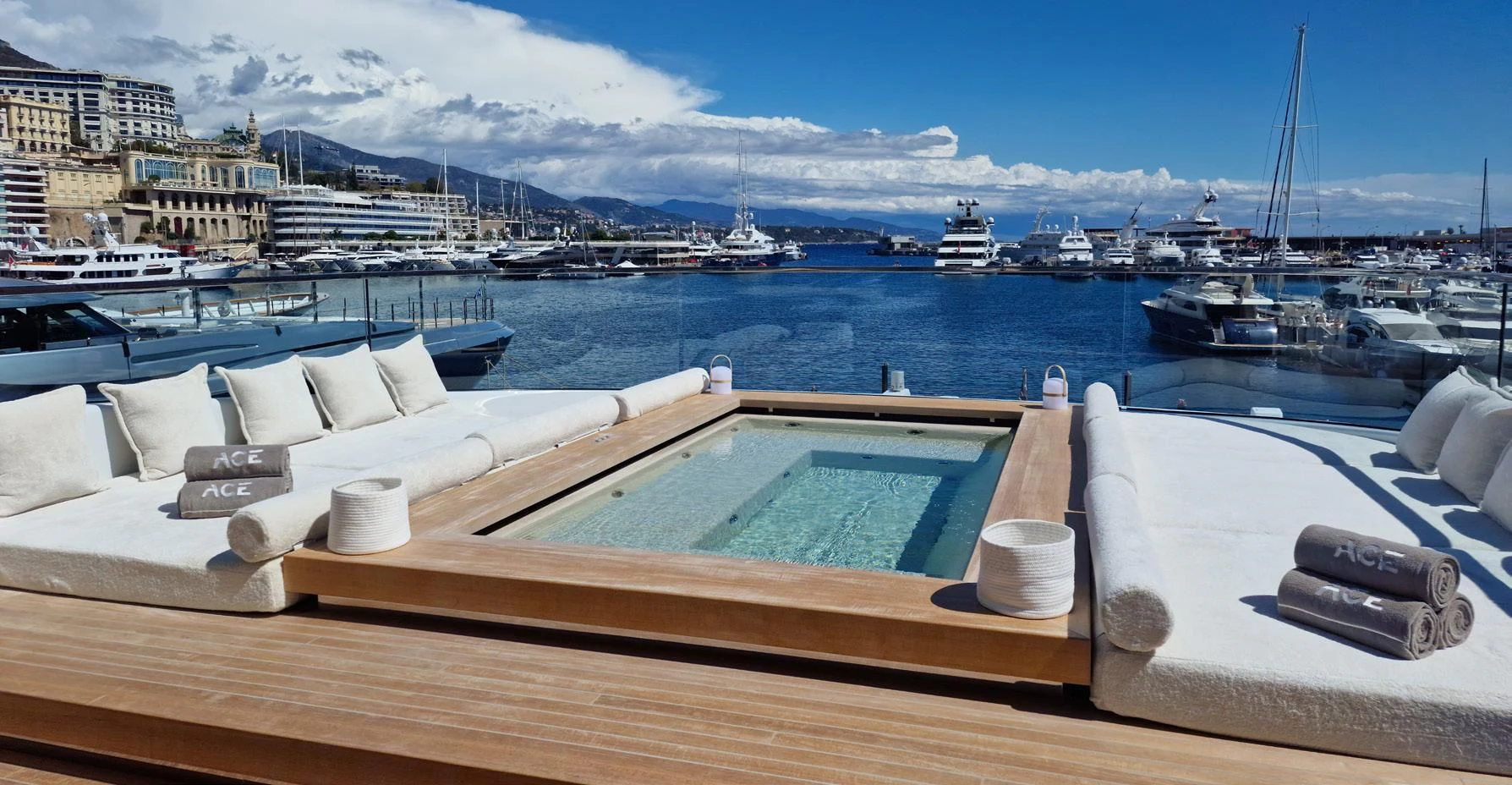 a large pool with boats in it aboard ACE Yacht for Sale