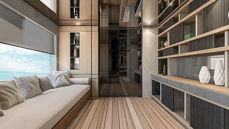 a room with a bed and a bookcase aboard ACE Yacht for Sale