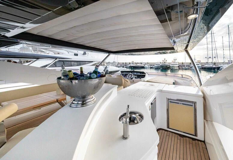 a large white boat with a metal bucket on the front aboard HIGH ENERGY Yacht for Sale