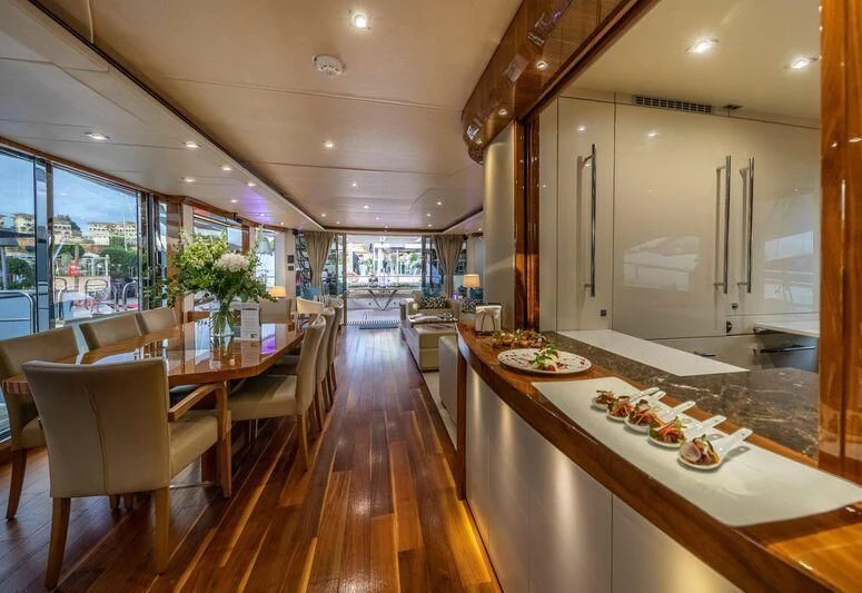 a kitchen with a large island aboard HIGH ENERGY Yacht for Sale