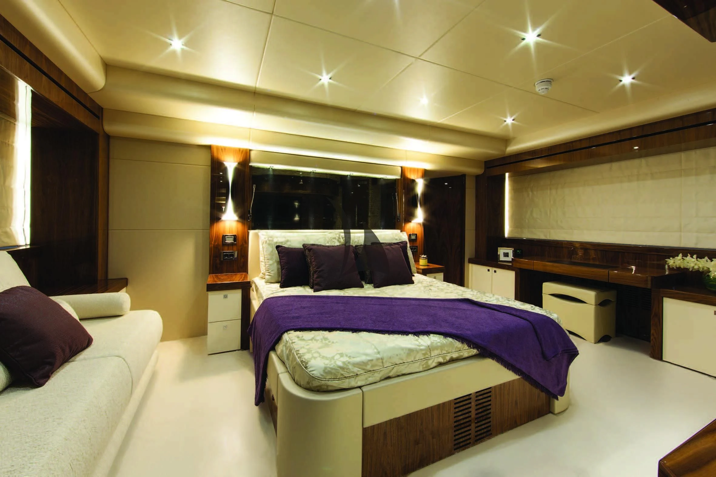a bedroom with a bed and a piano aboard HIGH ENERGY Yacht for Sale